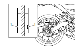 Checking the rear brake pads