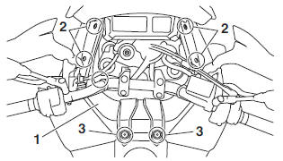 Removing the fuel tank front cover