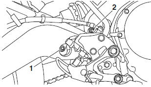 Removing the rear shock absorber assembly