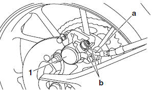 Installing the rear brake caliper