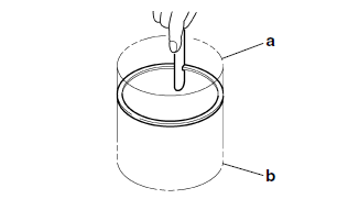 Checking the piston rings